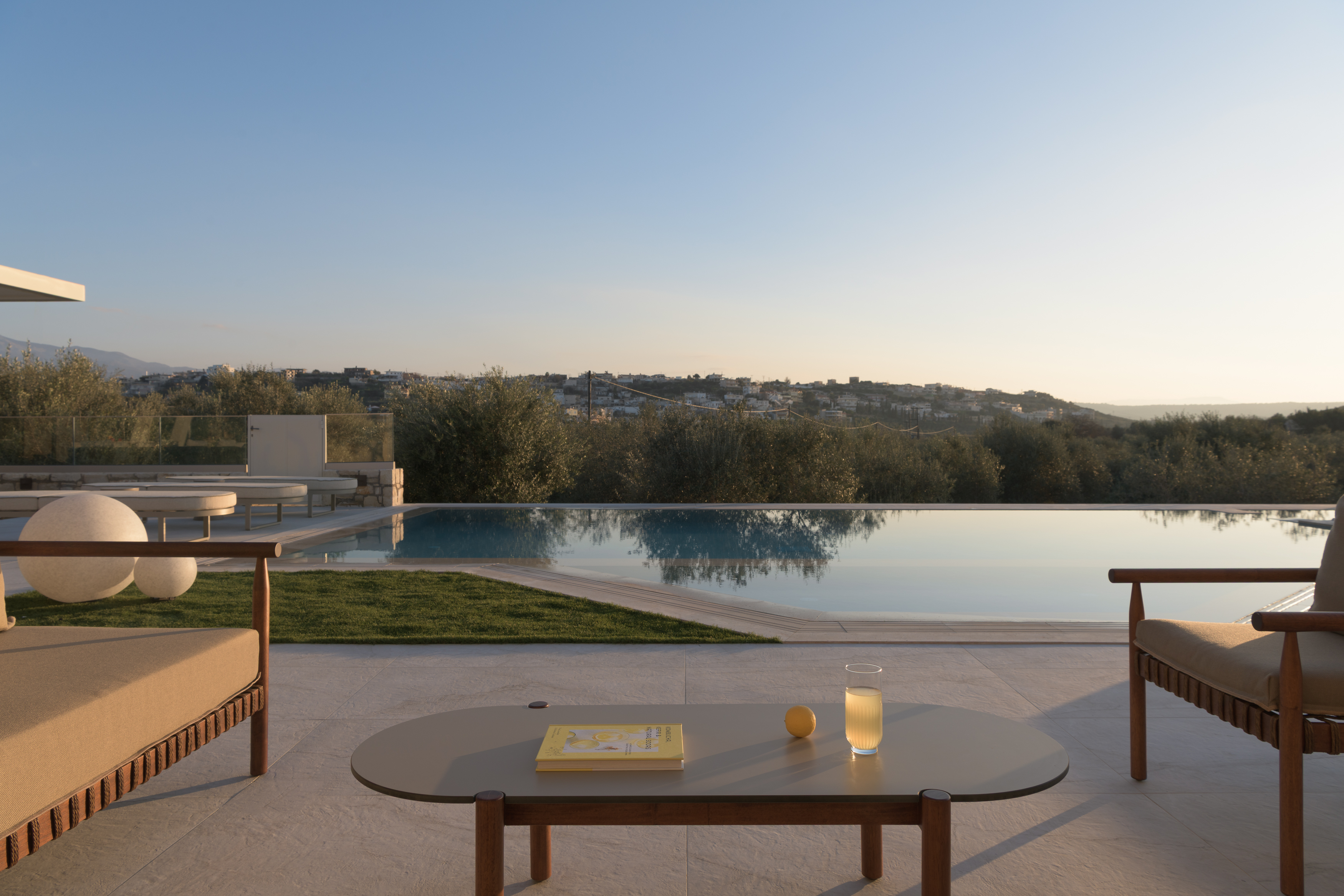Nestled among whispering olive trees, a sanctuary of serenity.