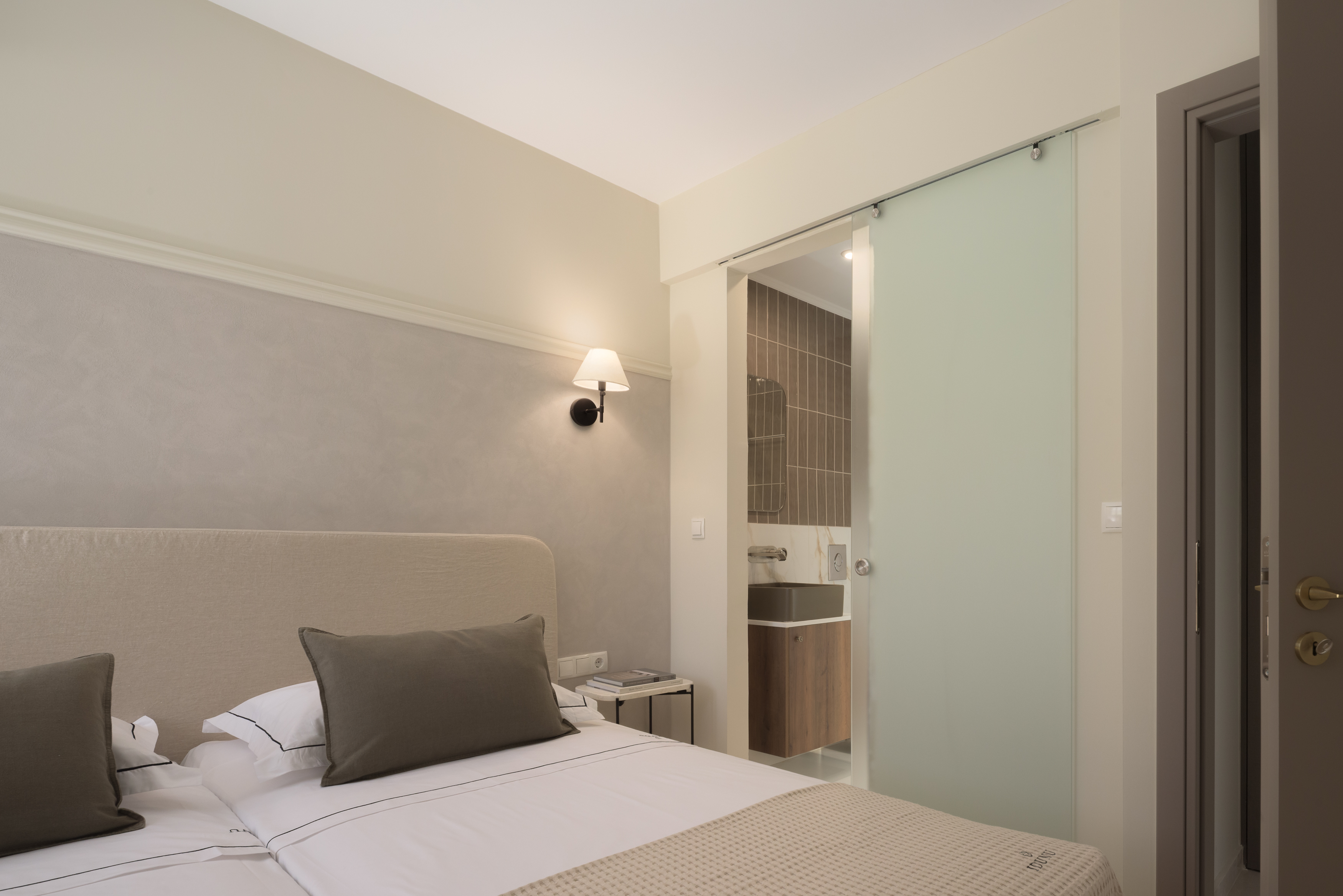 Beautifully appointed bedroom with en-suite bathroom.