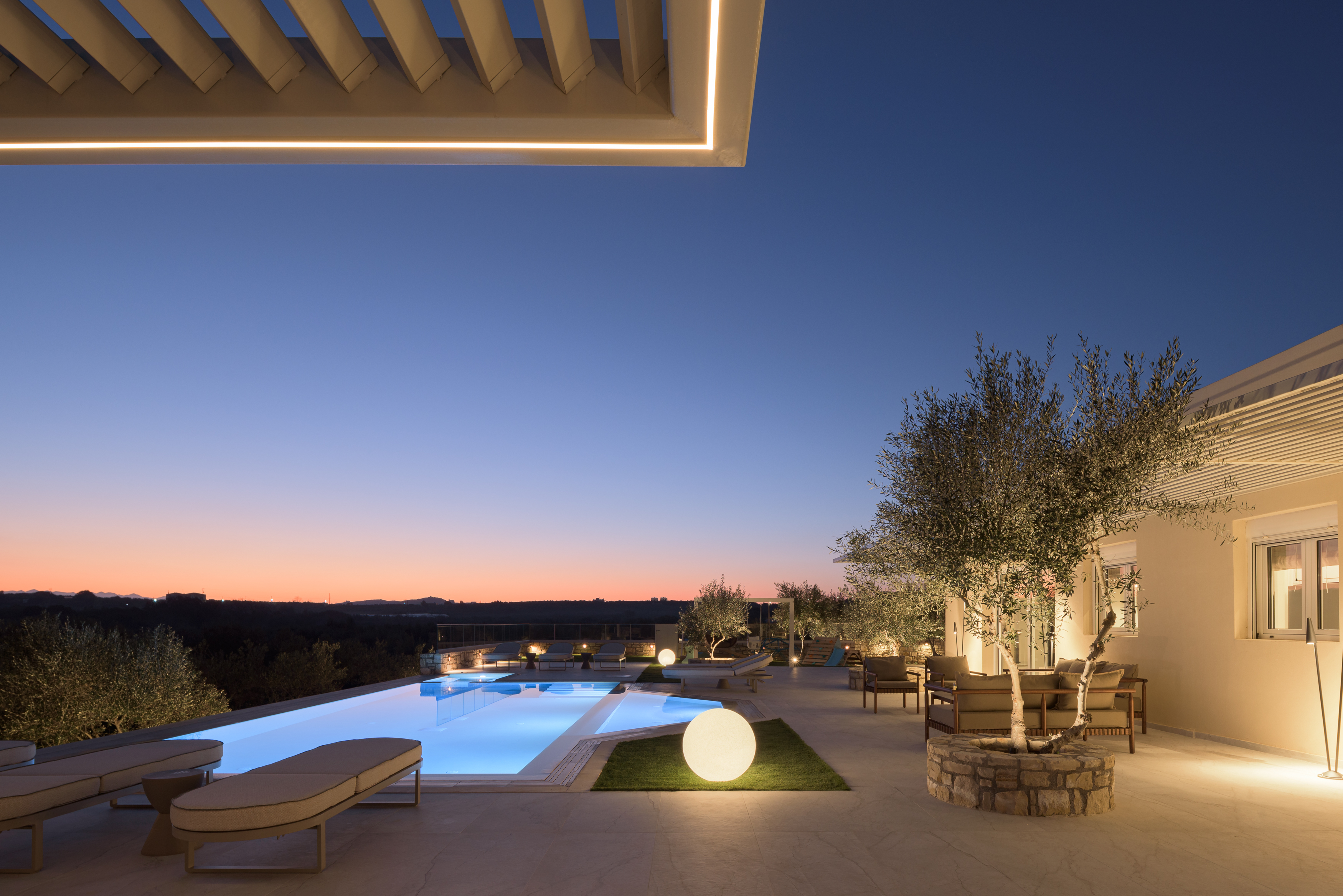 Savor the calm and beauty of the Villa's spaces after sunset.