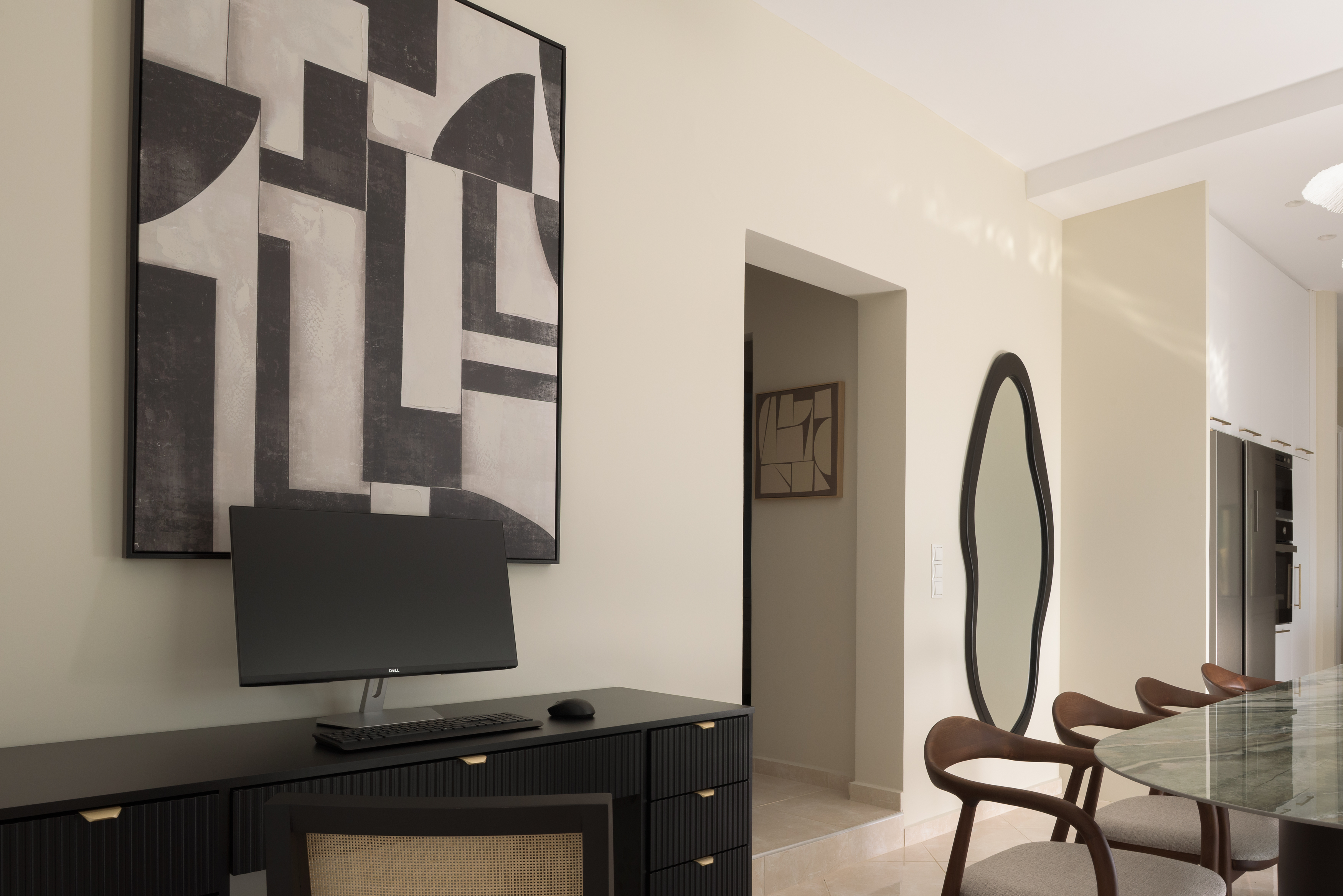 Stay productive in style with a dedicated workspace featuring a screen monitor and keyboard.