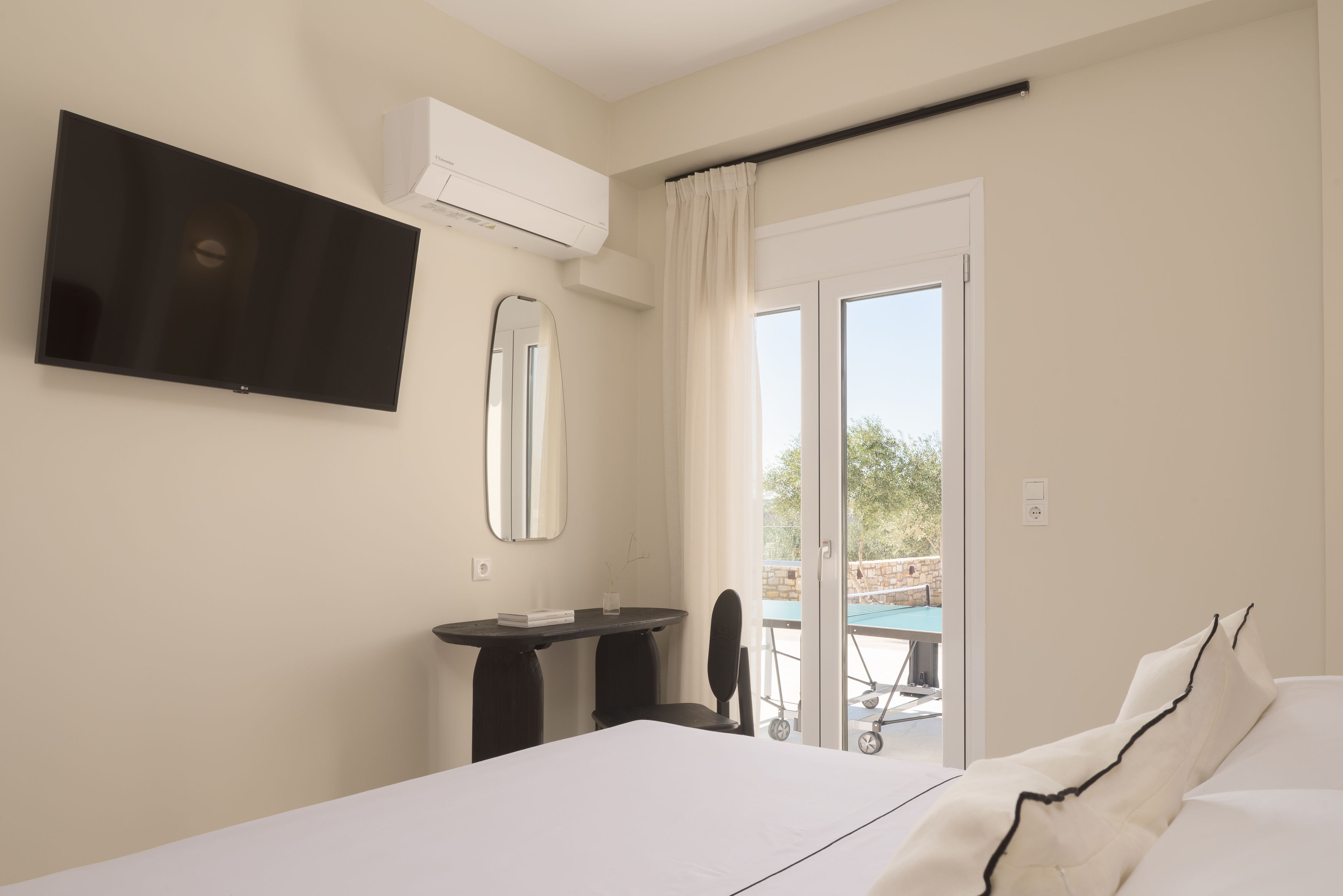 Experience tranquility in the uniquely designed bedroom of the Villa.