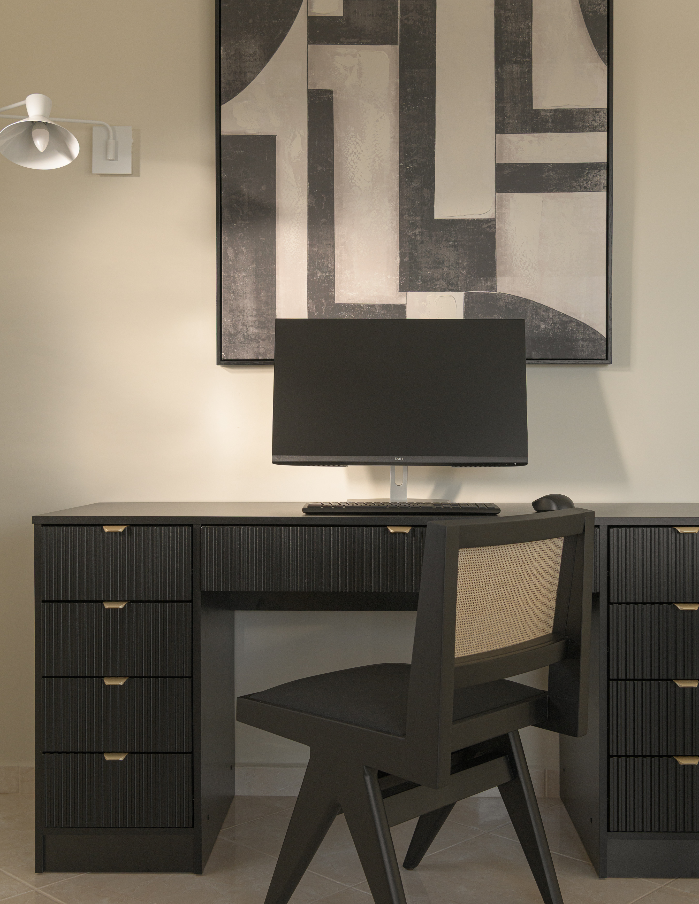 Stay productive in style with a dedicated workspace featuring a screen monitor and keyboard.