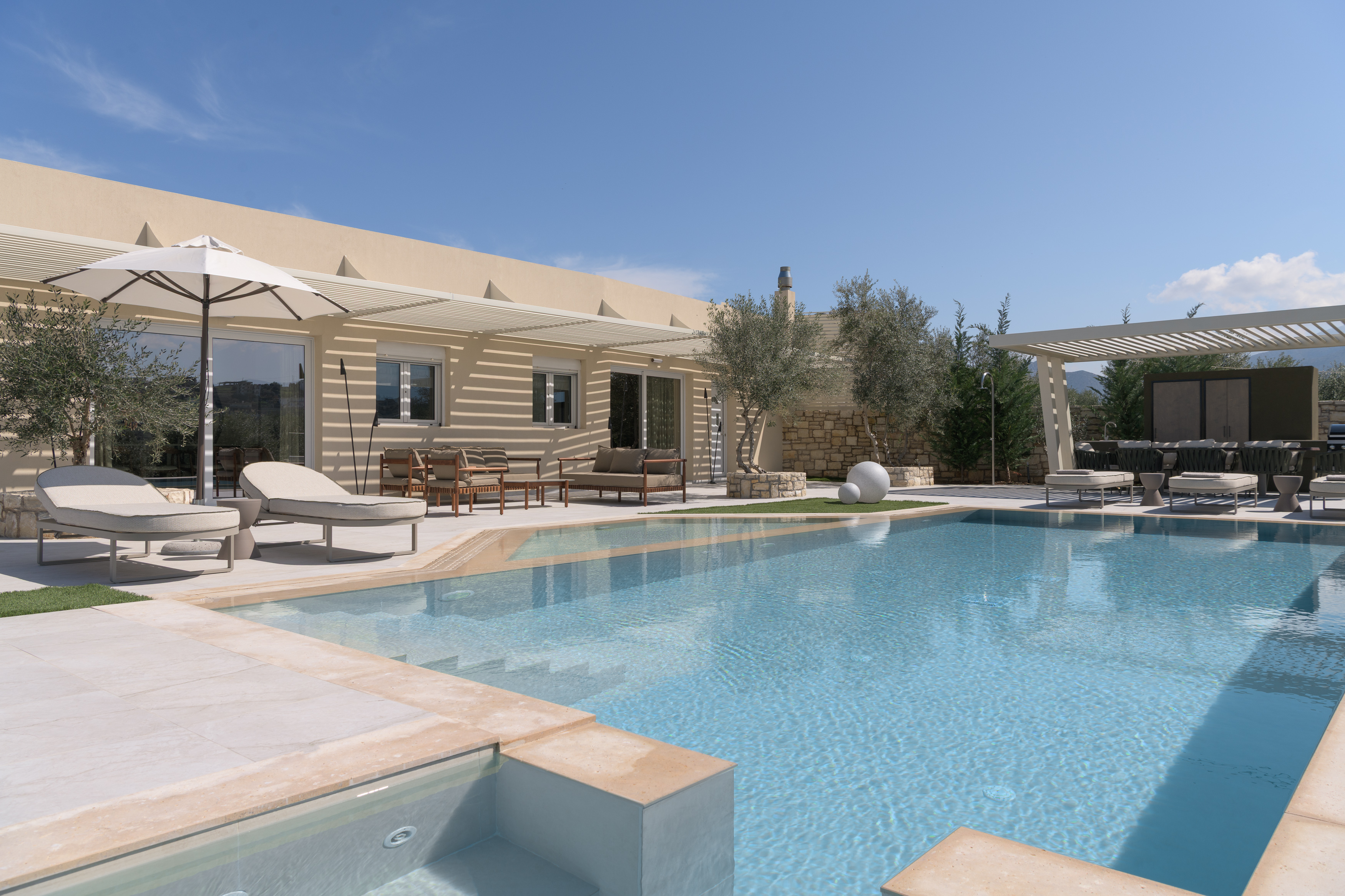 Bask in the Mediterranean sun by the private 60m² heated pool.