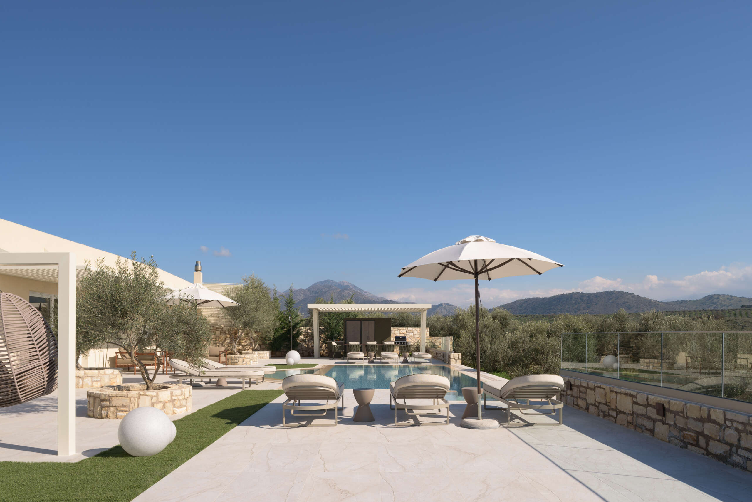 Bask in the Mediterranean sun by the private 60m² heated pool.