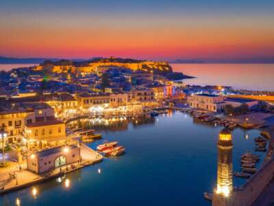 Rethymno city at Crete island in Greece. Aerial view of the old venetian harbor. Rethymno city at Crete island in Greece. Aerial view of the old venetian harbor.